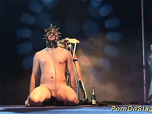 kinky fetish injection needle flash on stage